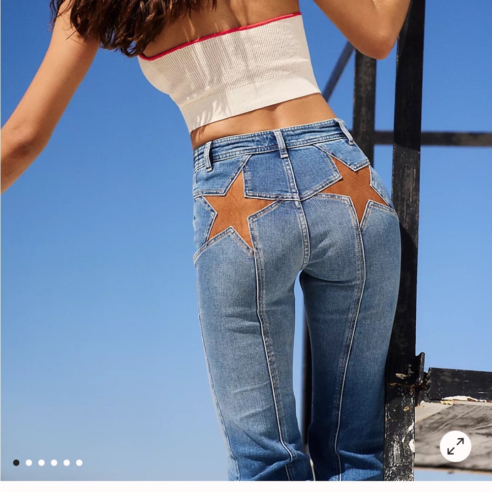 We The Free High Rise Blue Jeans with Brown Star Accents